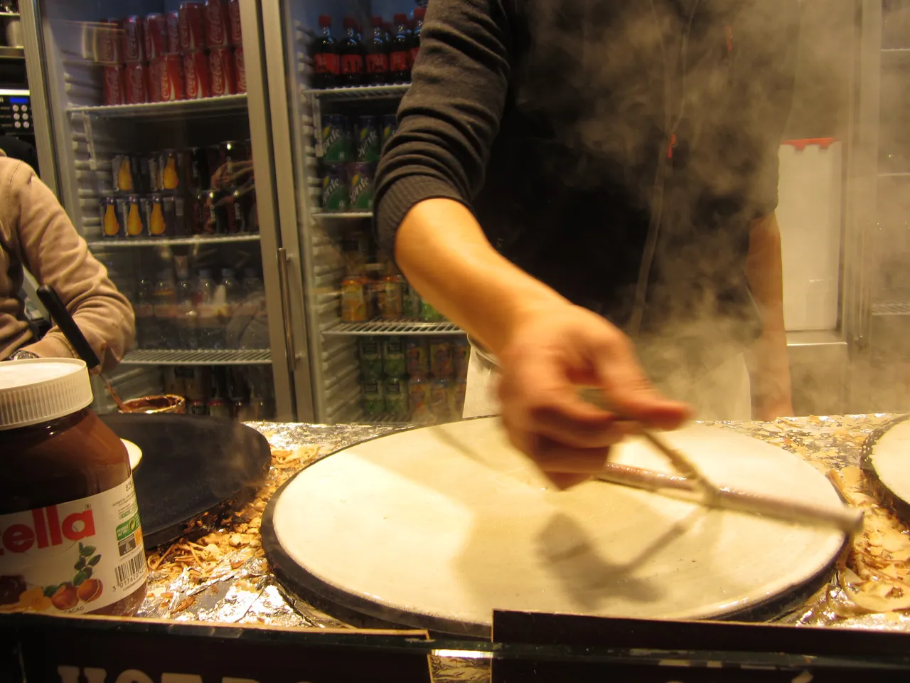 A crêpe being made on a griddle