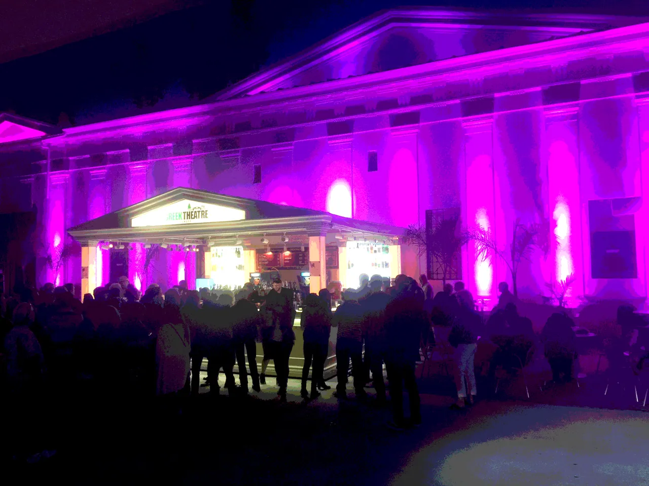 The Greek Theatre lit in purple at night